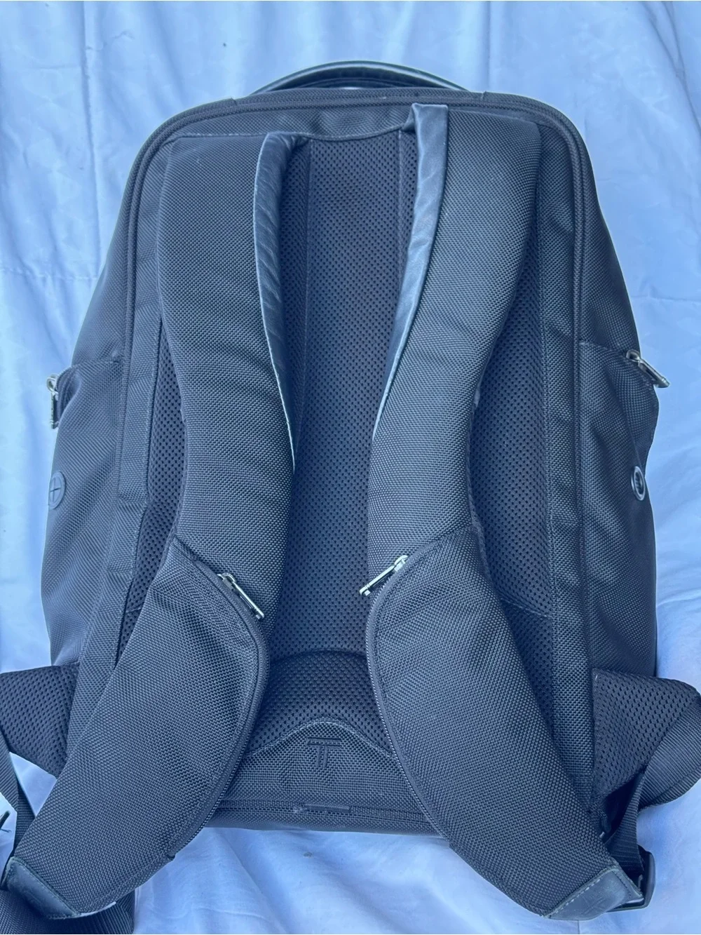 Tumi Black Nylon Travel Backpack with Multiple Compartments